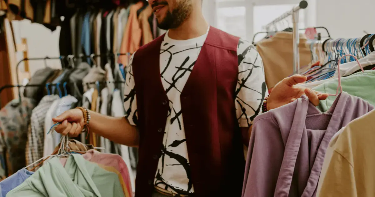 Man holding clothes