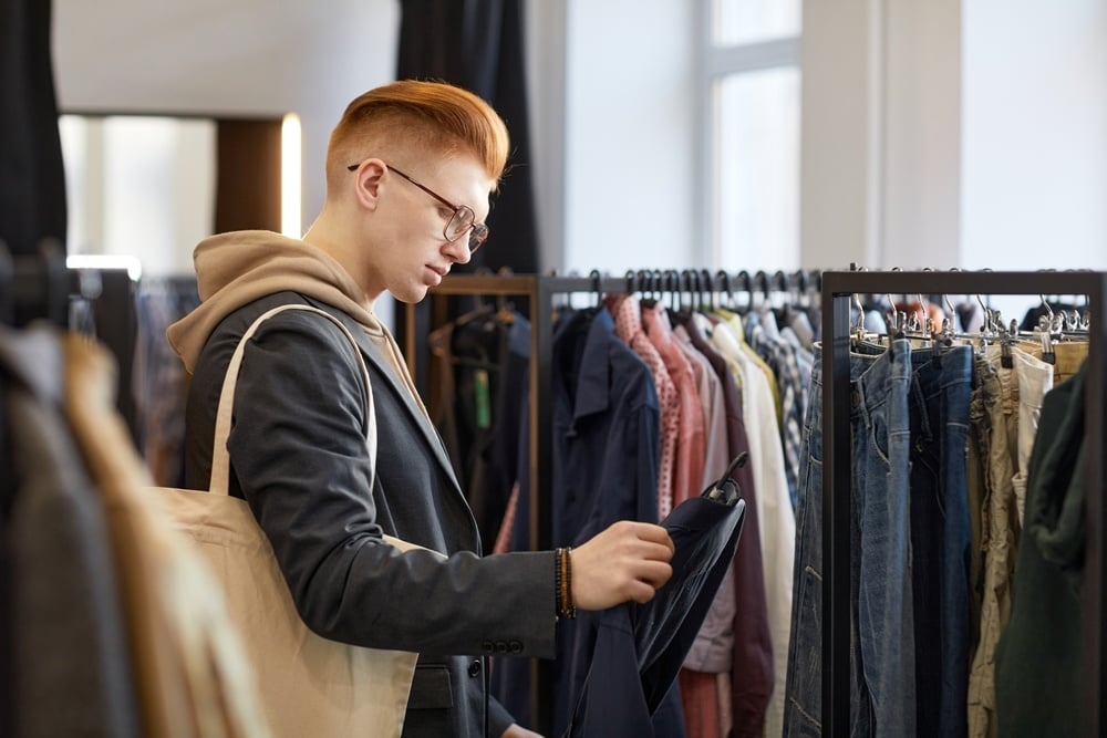 Man looking through thrift store