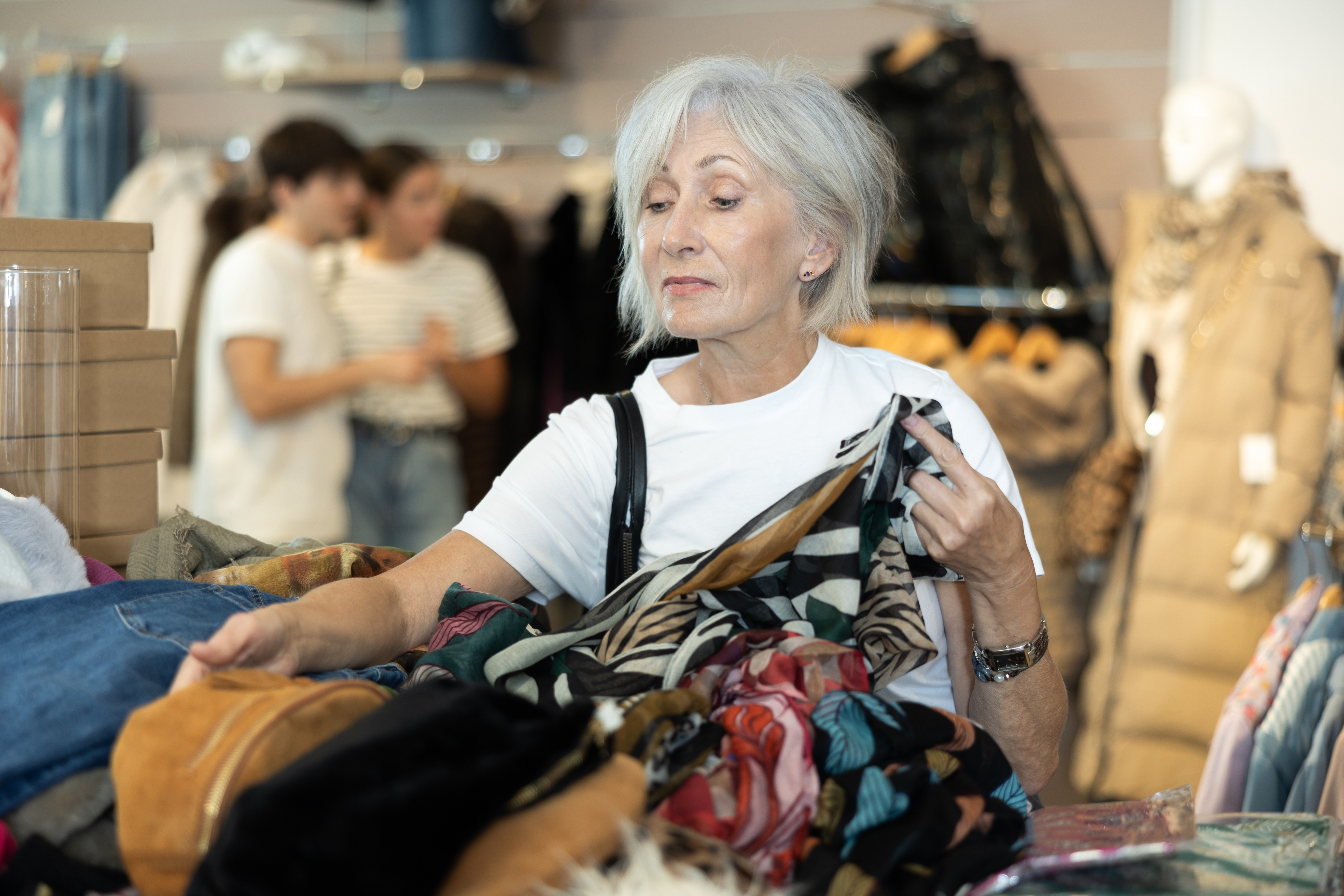 Woman shopping at thrift store